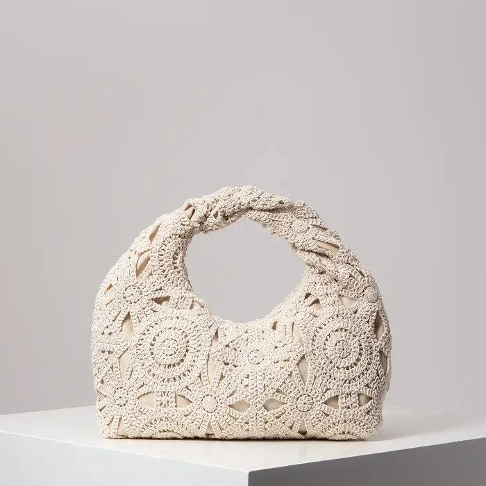 Sac à main tissé à motifs