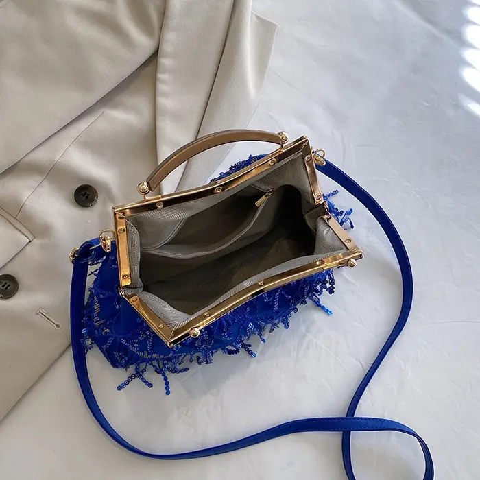 Sac à main à paillettes de soirée avec pompon