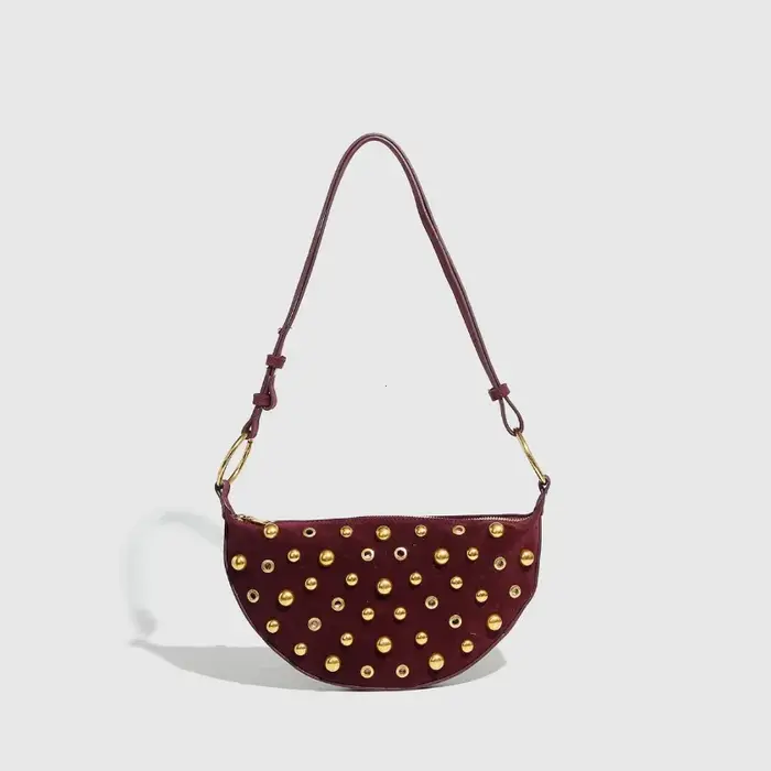Sac à bandoulière clouté de styliste