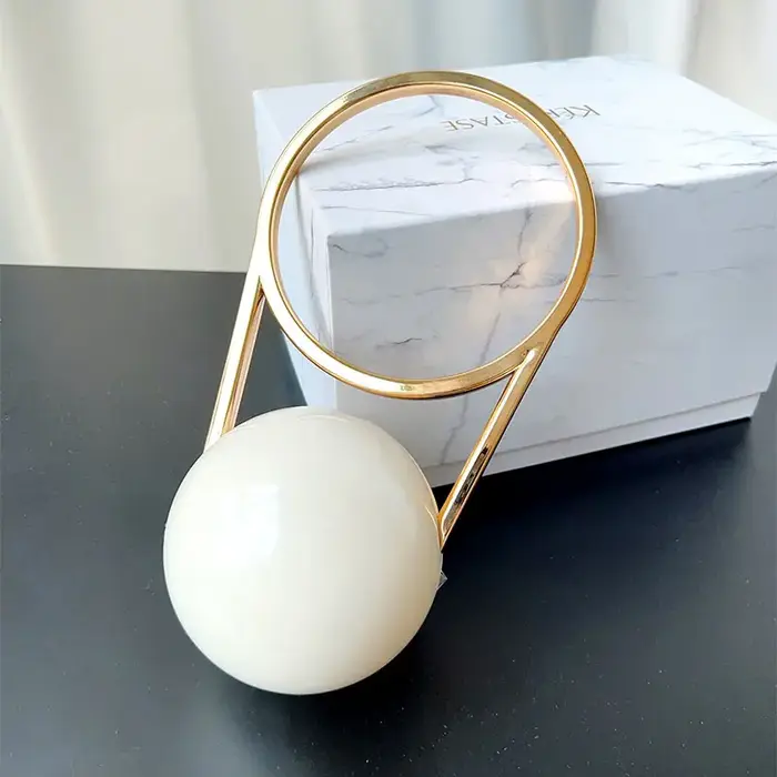 Pochette de soirée de luxe de styliste avec poignée en boule