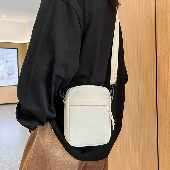 Petit sac à bandoulière pour hommes et femmes