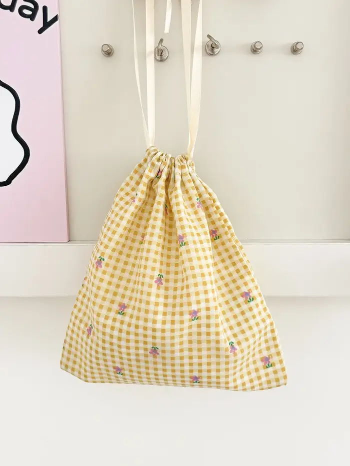 Sac à cordon jaune à motif floral