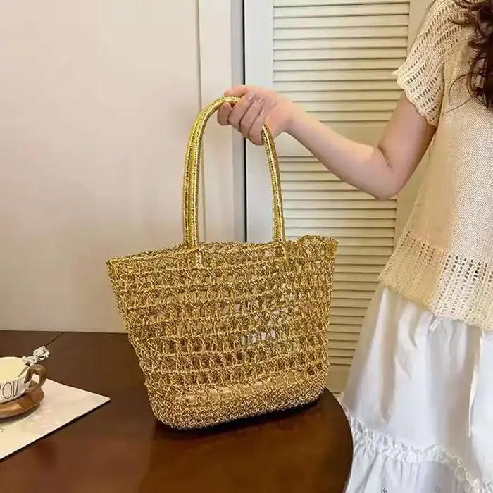 Sac fourre-tout doré tressé à la main ajouré