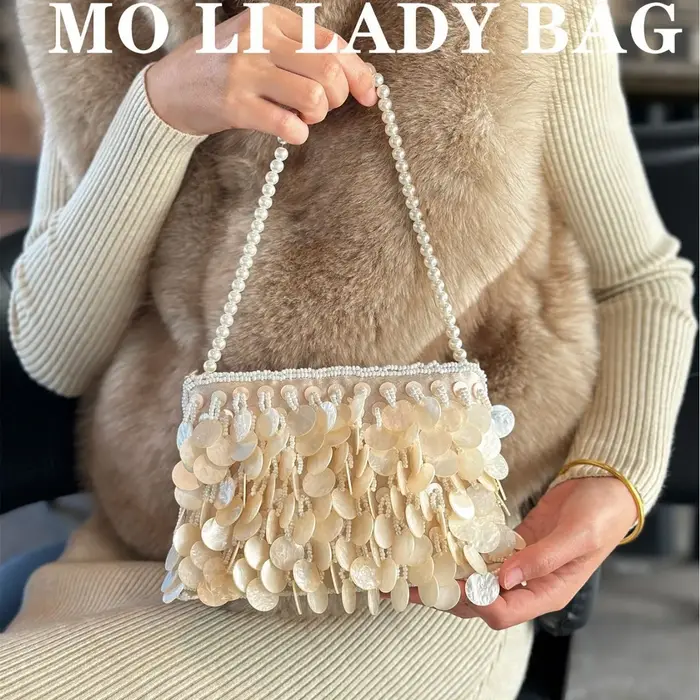 Pochette en perles de coquillage