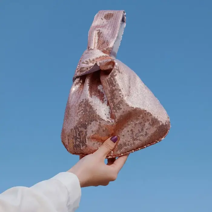 Sac de poignet à nœud pailleté
