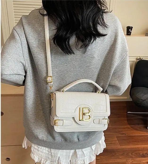 Sac à langer classique : Sac fourre-tout élégant en cuir grande capacité pour femme