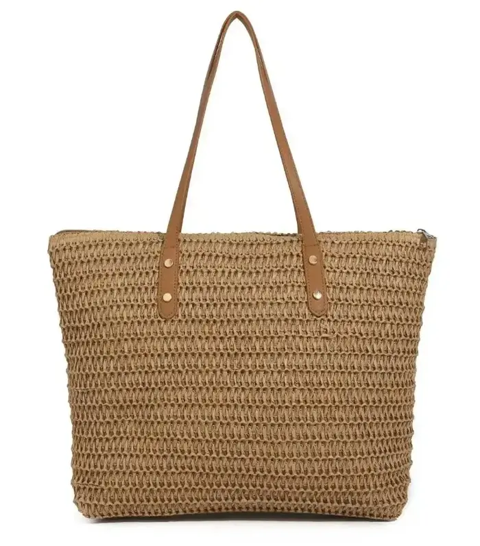 Sac à langer minimaliste de luxe : élégant sac à main bandoulière pour femme avec une touche de design vintage et un grand compartiment.