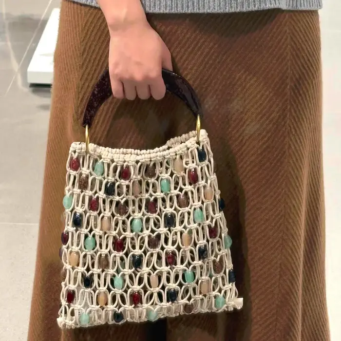 Sac à main rétro tissé à la main avec perles creuses pour femmes