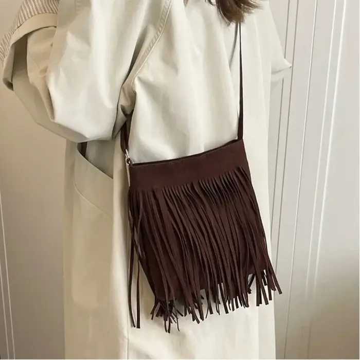 Sac bandoulière vintage en suède à franges