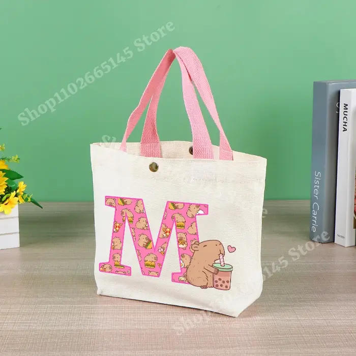 Capibara mignon sac fourre-tout pour femmes Anime Capybara lettre A-Z sac à main filles Shopping voyage organiser toile pochette cadeau offres spéciales
