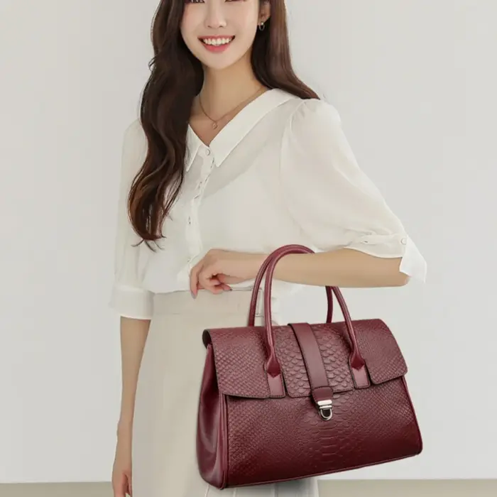 Sac à main de grande qualité avec motif serpent