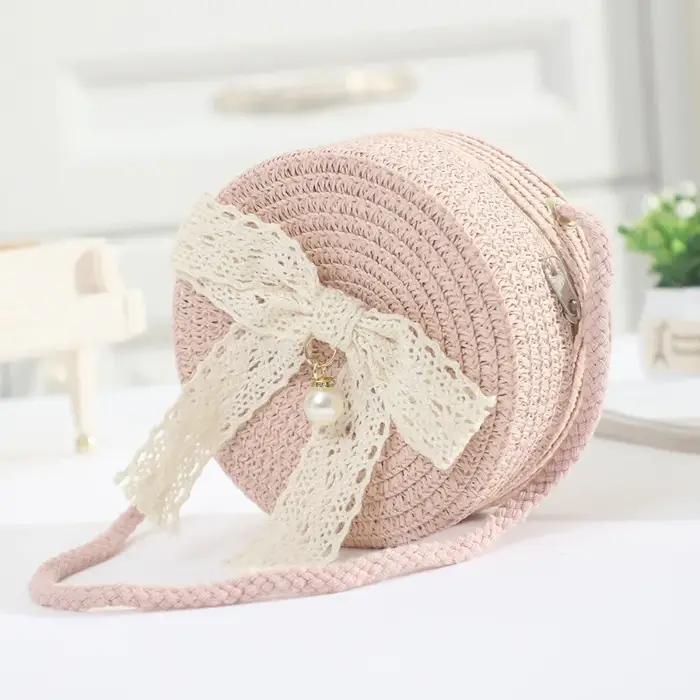 Sac en paille avec nœud en dentelle