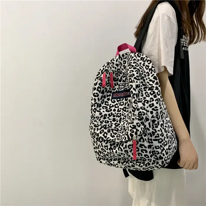 Sac à dos décontracté en toile à imprimé léopard pour femme