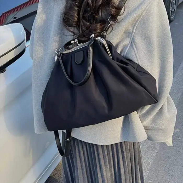 Sac à main pochette imprimé léopard pour femme avec fermoir métallique