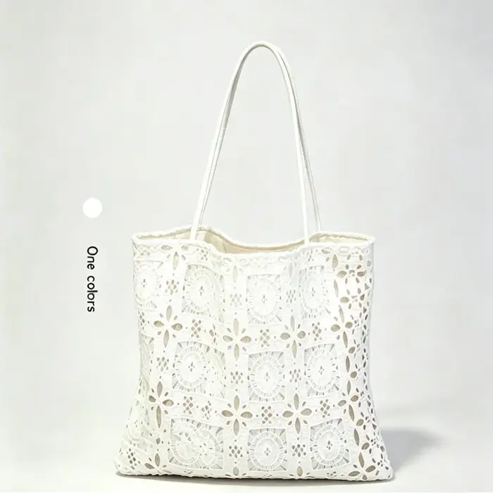 Sac à main blanc en dentelle à sequins