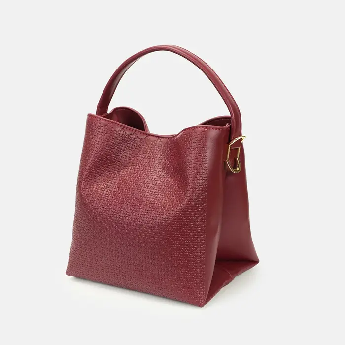 Sac seau CH Monogram avec poignée supérieure et bandoulière amovible pour le quotidien