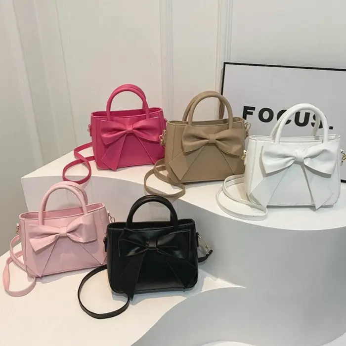 Sac fourre-tout élégant en similicuir avec grand nœud décoratif