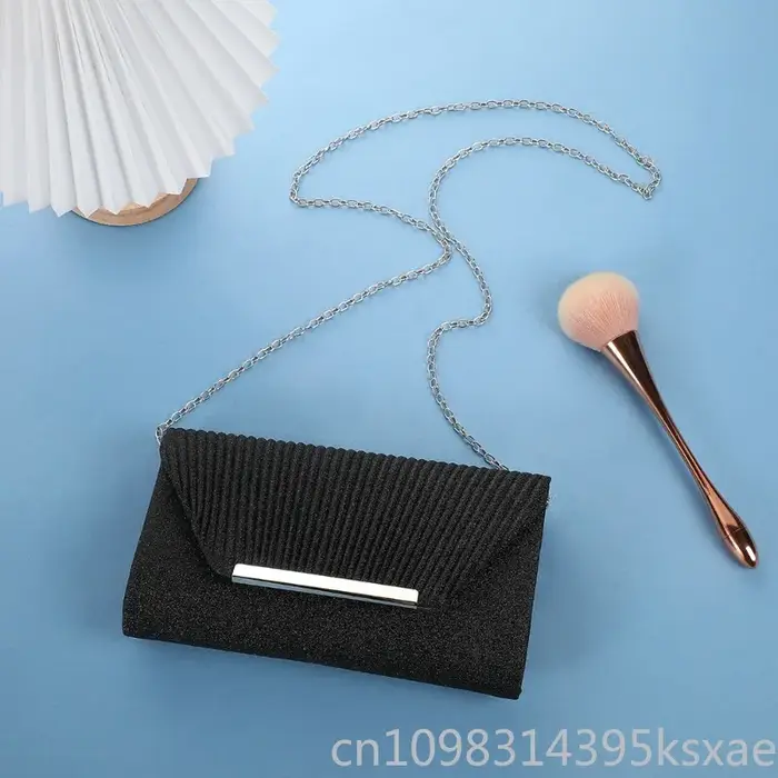 Pochette de soirée à motif coquillage
