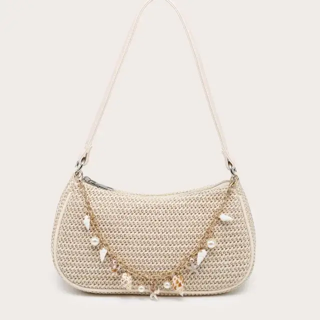 Sac à bandoulière bohème en paille d'été avec breloques coquillages