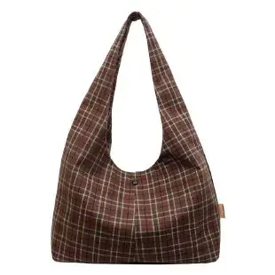 Sac à langer chic et polyvalent à boucles