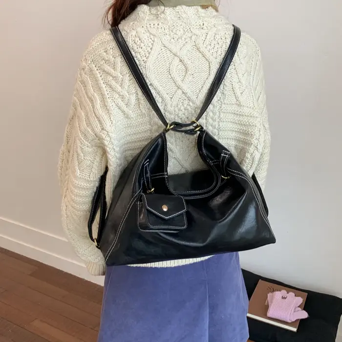 Sac à bandoulière noir avec porte-monnaie