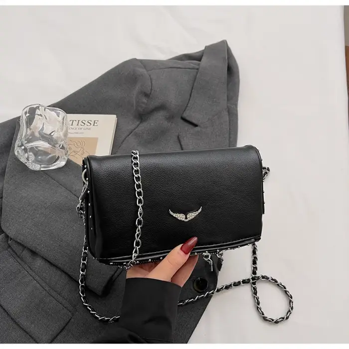 Sac bandoulière de luxe en PU couleur unie avec logo aile, léger, avec fermeture magnétique et chaîn