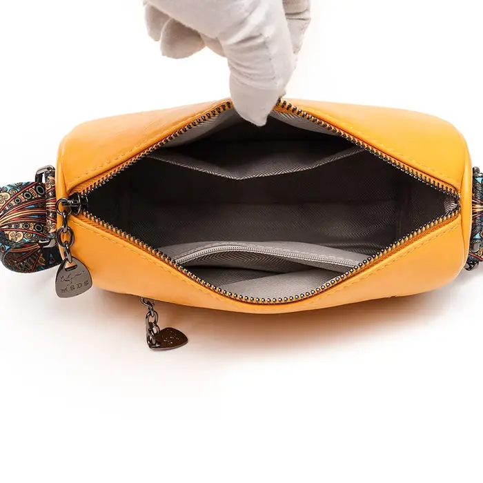 Sac à bandoulière en peau de mouton souple pour femme