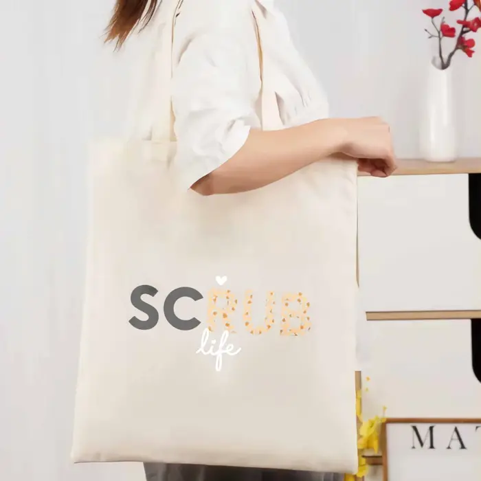 Sac fourre-tout en toile, texte de vie mat crème et motif de points, adapté à un usage quotidien et 
