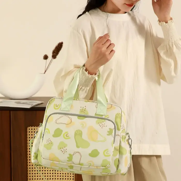 Sac à dos de voyage pour bébé - Grande capacité, portable, avec bandoulière et motif imprimé, idéal pour les sorties.
