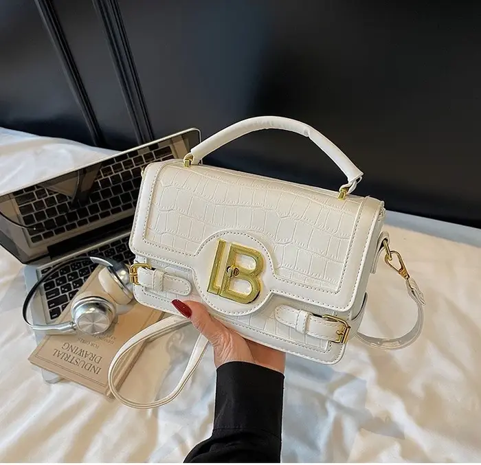 Sac à langer classique : Sac fourre-tout élégant en cuir grande capacité pour femme