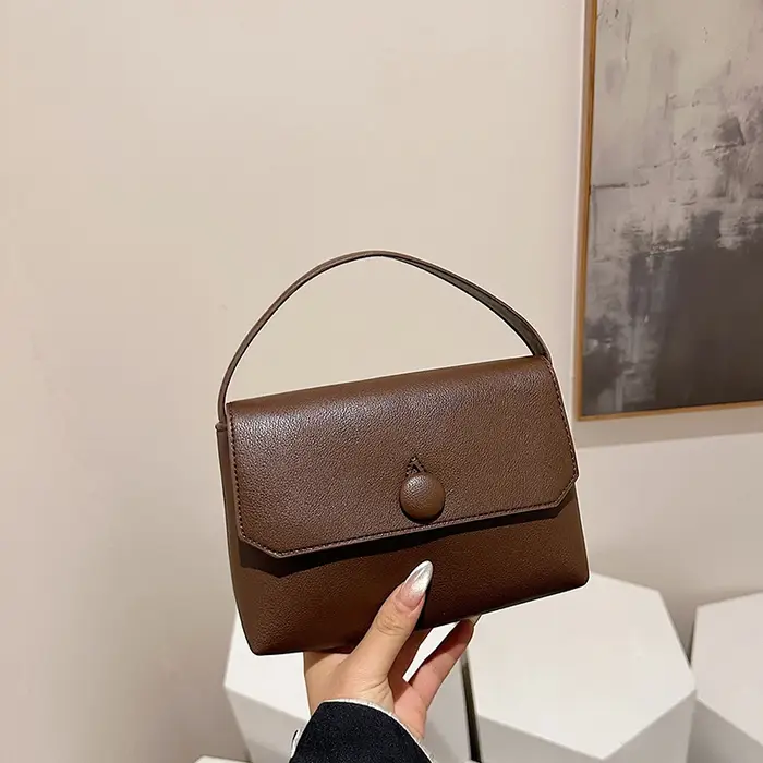 Fil à coudre décontracté PU fermeture éclair grande capacité sacs à bandoulière pour les femmes douce personnalité