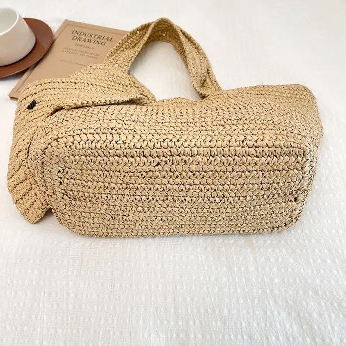 Sac à main en raphia tressé à la main en forme d'éléphant