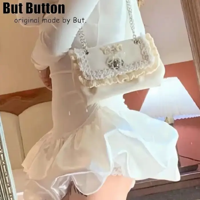 Lolita – sac à main élégant avec nœud en dentelle satinée