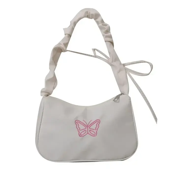 Sac à bandoulière brodé avec nœud papillon