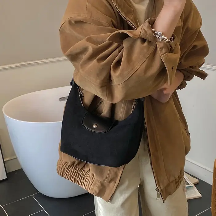 Sac à main vintage en daim