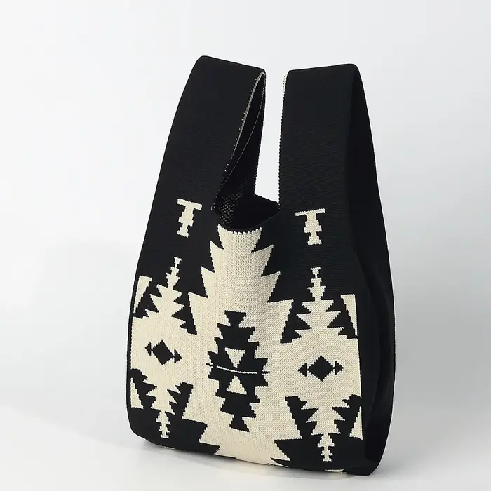 Sac à main de style ethnique bohème avec symétrie angulaire