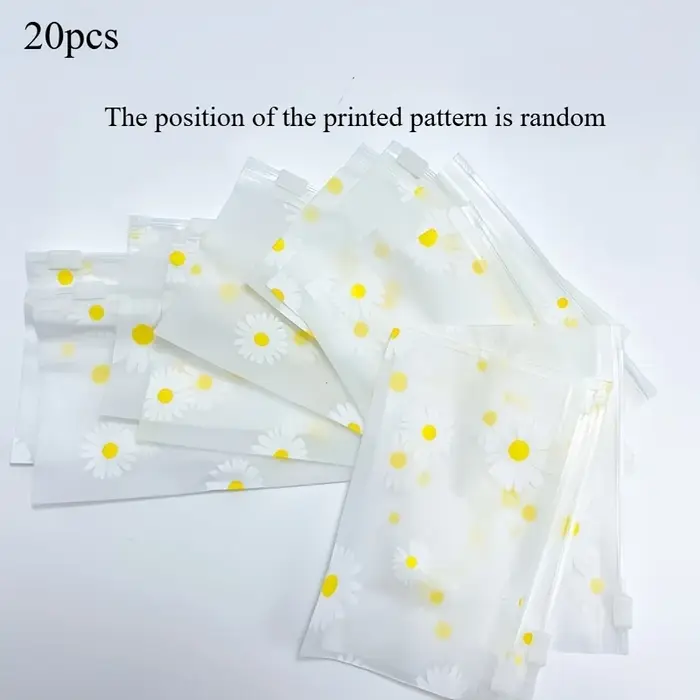 Sac zippé à imprimé marguerite 20A avec finition mate