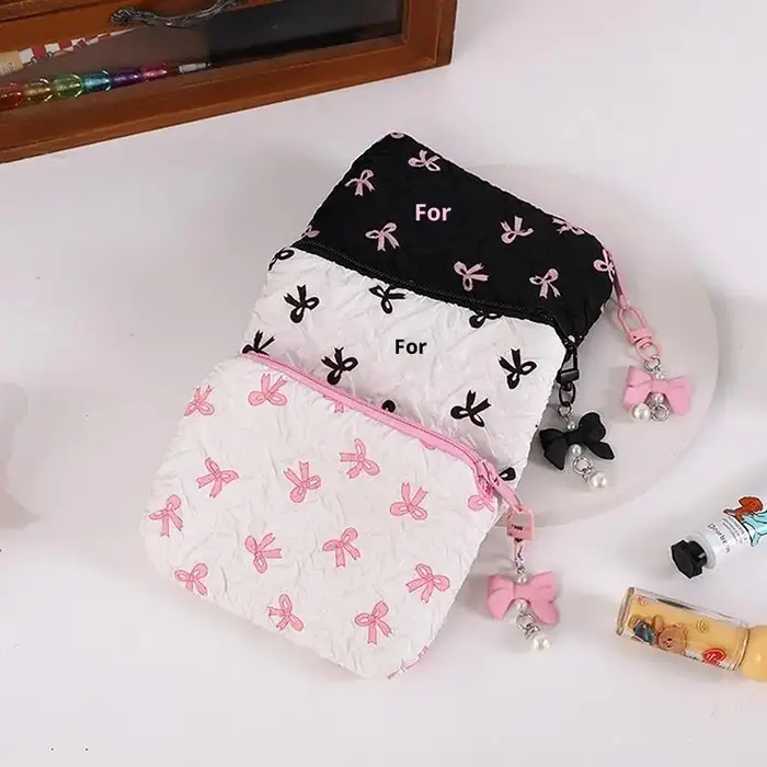 Trousse de maquillage en tissu avec nœud mignon