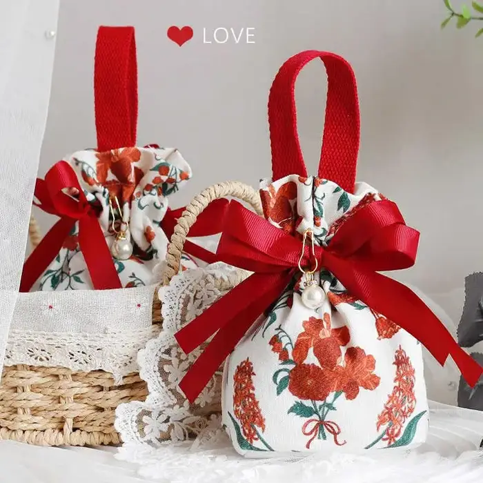 Mini sac à cordon en toile à motif floral avec nœud papillon et chaîne de perles