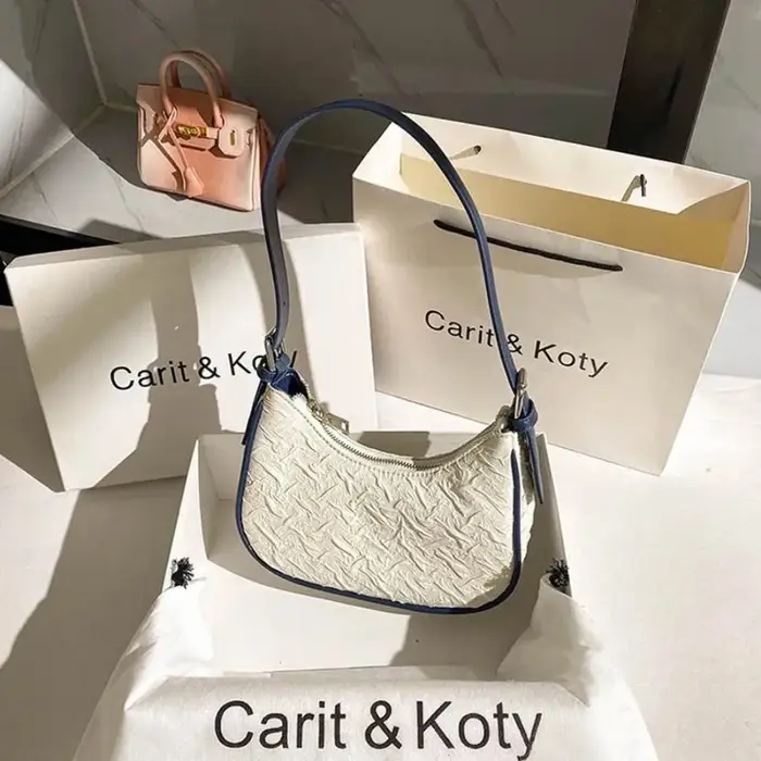 Sac plissé tendance de l'année, design original et raffiné, sac croissant pour femme, design de niche estival, sac porté épaule