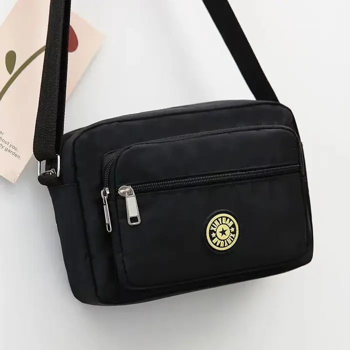 Sac à bandoulière pour femme, sac à main durable à plusieurs poches avec sangle réglable, idéal pour