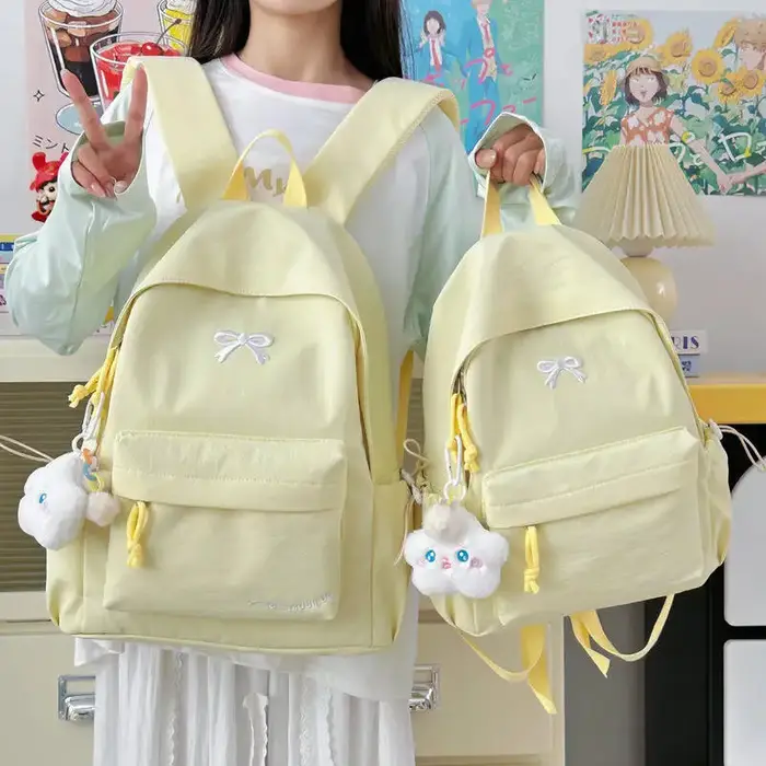 Nouveau sac à dos brodé élégant Style coréen japonais mignon sac d'école décontracté pour filles étudiants sac de voyage pour les déplacements quotidiens