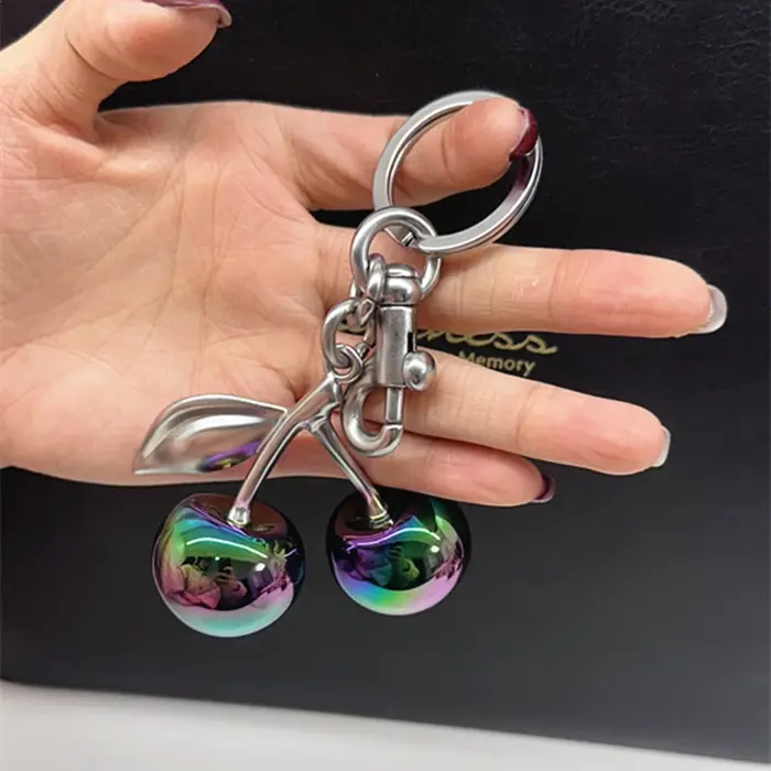 Pendentif cerise de couleur dégradée pour sac à main d'entraîneur