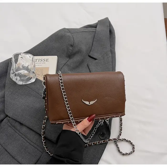 Sac bandoulière de luxe en PU couleur unie avec logo aile