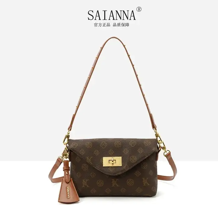 Sac à langer premium pour femme, sac bandoulière en cuir, luxe vintage, minimaliste, design élégant,