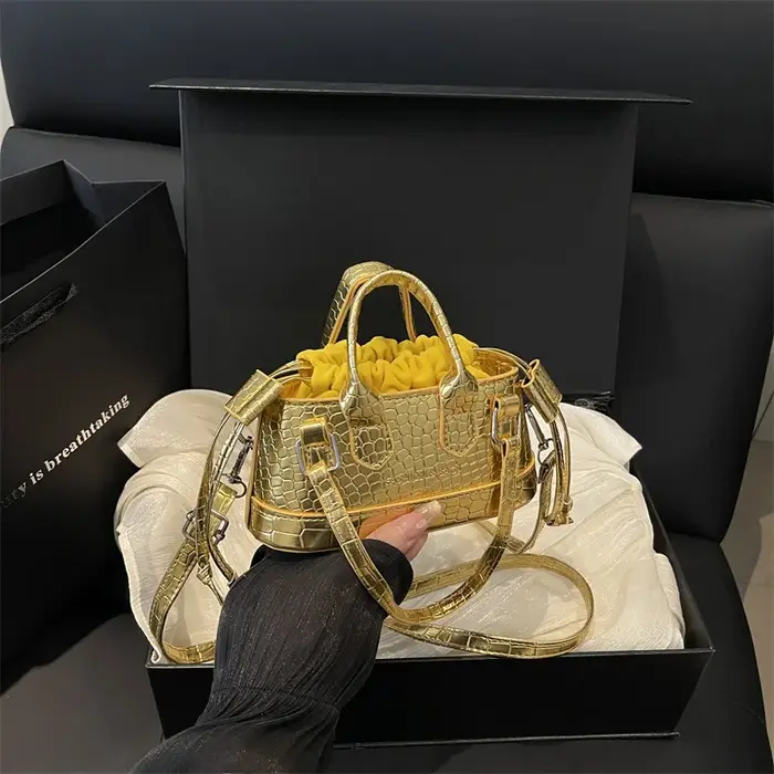 Sac seau mini à motif crocodile pour femme