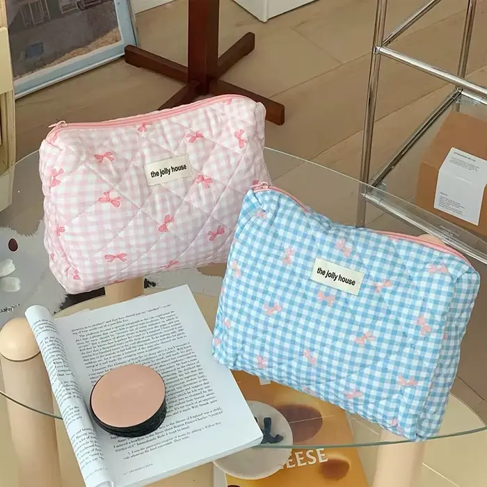 Nouveau dessin animé nœud papillon fourre-tout maquillage sac à fermeture éclair femmes grande capacité Quilting pochette sac de toilette mignon Portable sac de rangement cosmétique