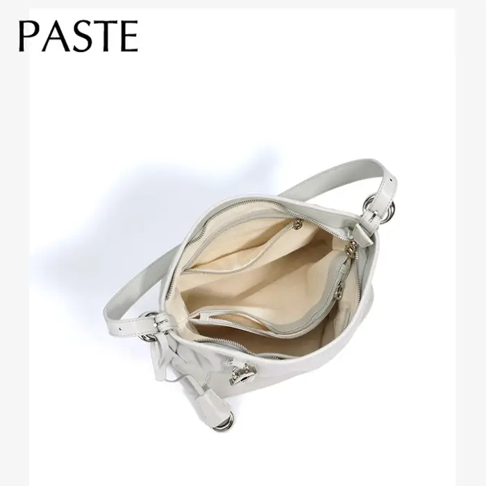 Sac à main en cuir de vache brillant pour femmes