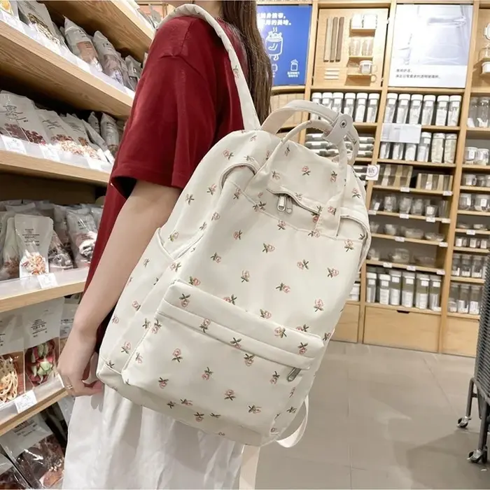 Sac à dos floral frais pour étudiante, sac à main de voyage, style urbain simple, sac en nylon pour femme, antivol, réduction de la charge, lycée, éducation