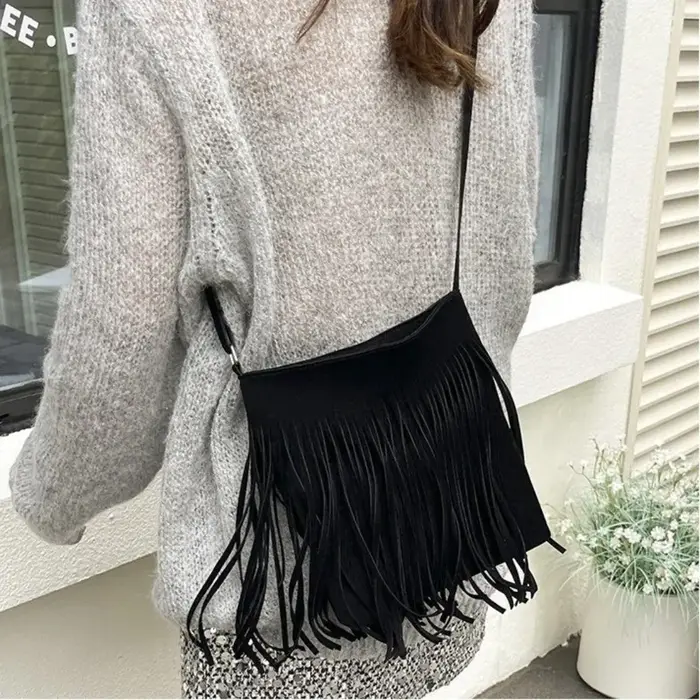 Sac bandoulière vintage en suède à franges